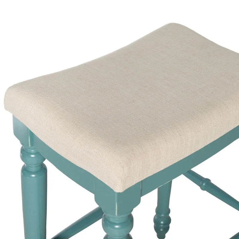 Backless Bar Stool with Turned Legs and Plush Curved Seat